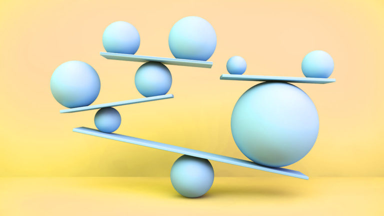 An assortment of orbs balancing on planks.