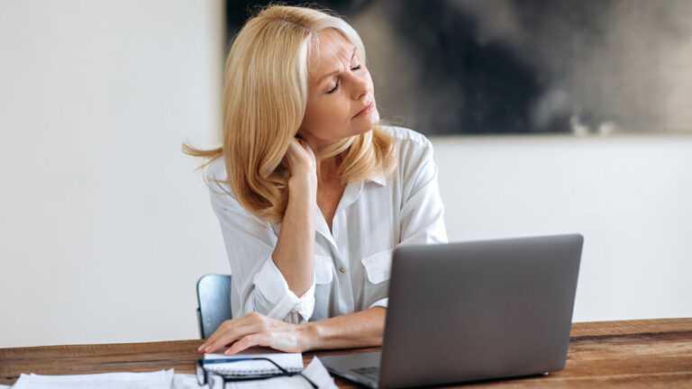 Stressed woman trying to get a small business loan with bad credit.
