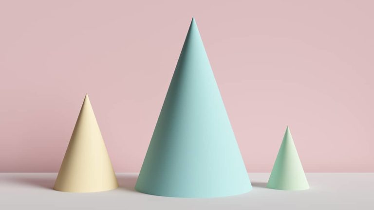 3D pastel cones in front of a pink background.