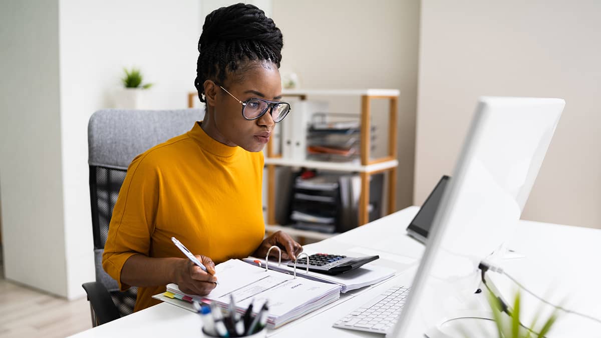 Business owner filling out Form 944.