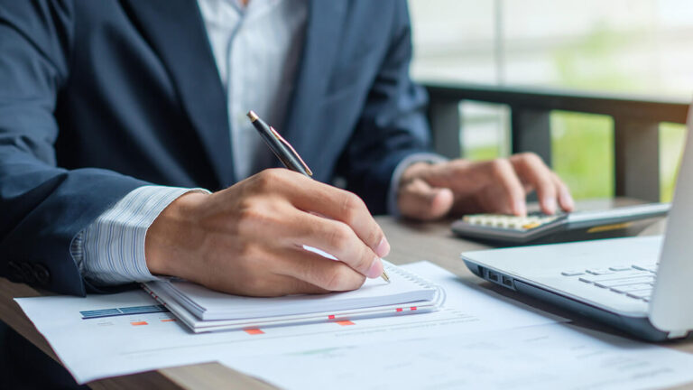 Business owner handling franchise accounting.