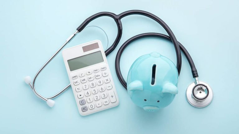 Piggy bank, calculator, and stethoscope.