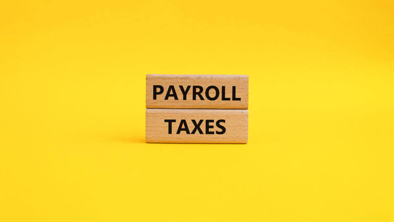 Wood blocks that says "Payroll Taxes."