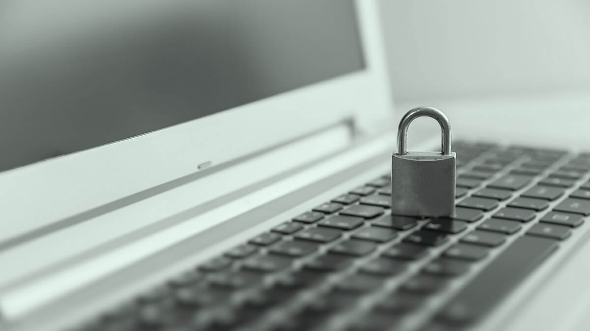 A lock on top of a laptop.