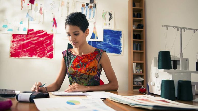Woman setting up her company's accounting books.