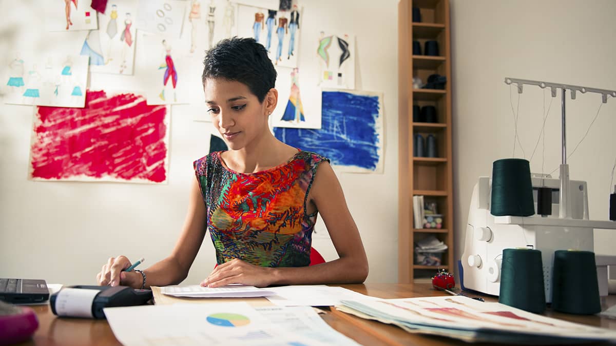 Woman setting up her company's accounting books.