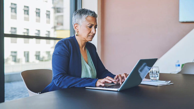 Business owner reviewing income withholding order.