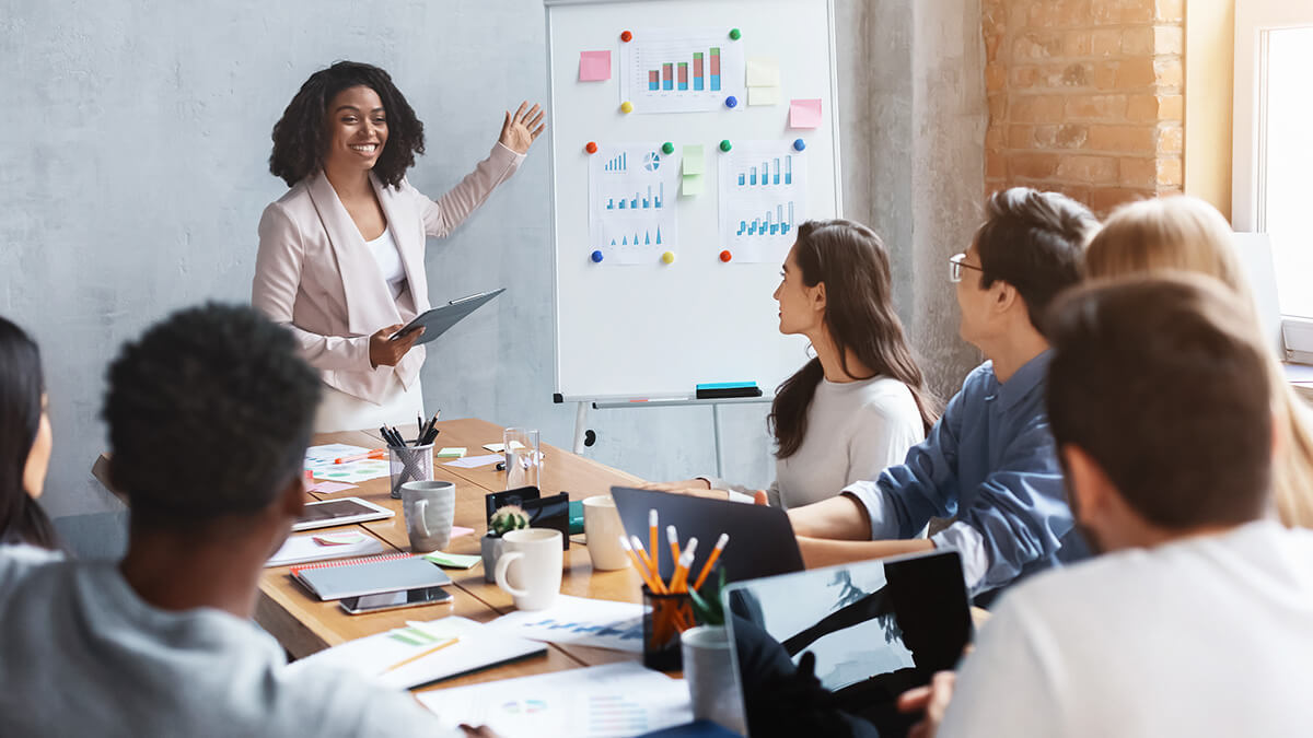 Business owner doing an investment proposal in front of a panel of investors.