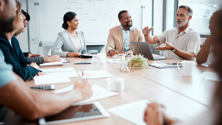 Employees in a meeting.