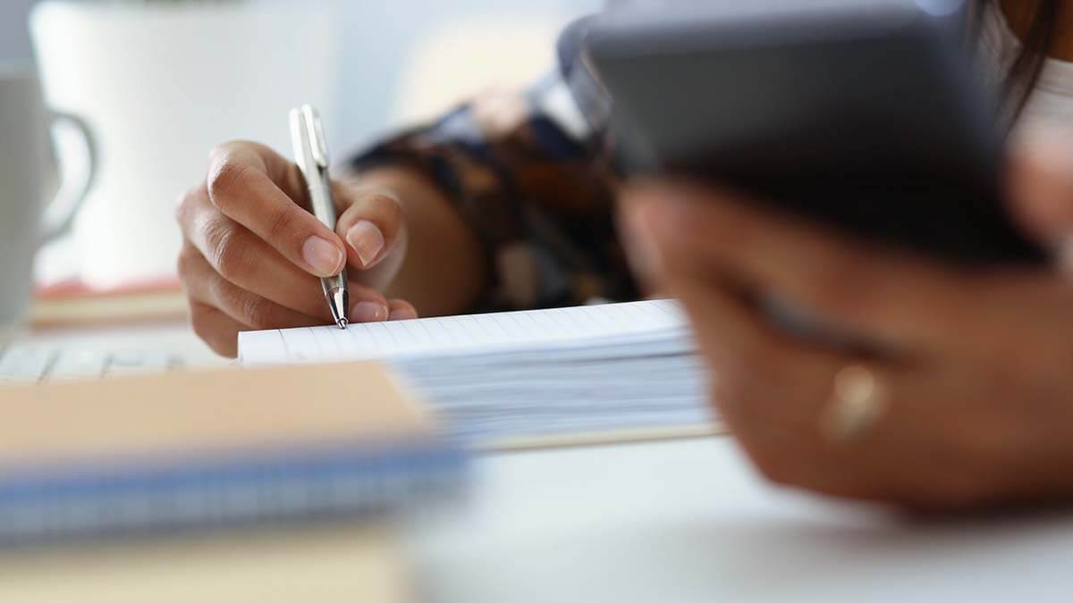 Employer filling out documents.