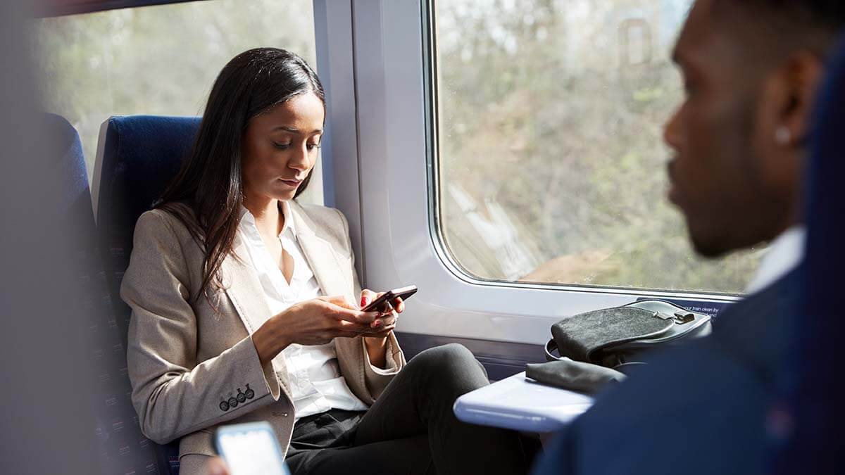 Two co-workers traveling on a train.