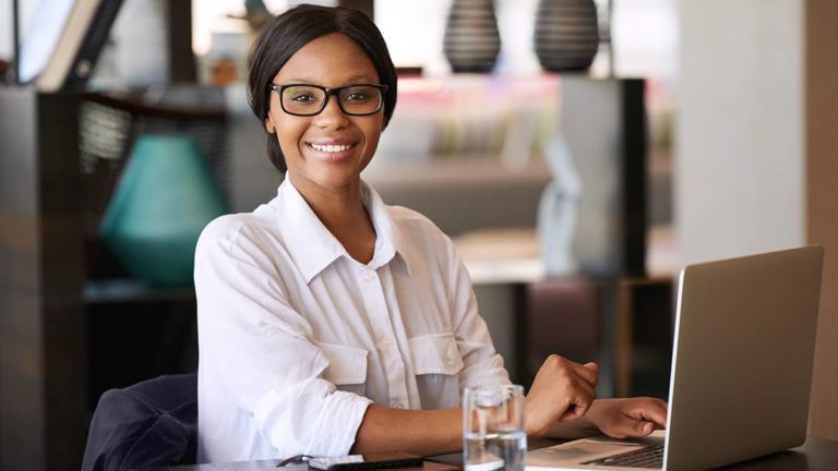 Woman smiling at the camera.