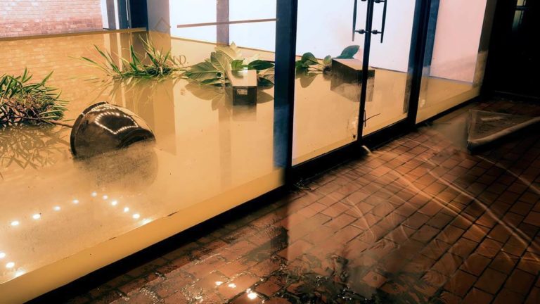 Business with flooding in the lobby.