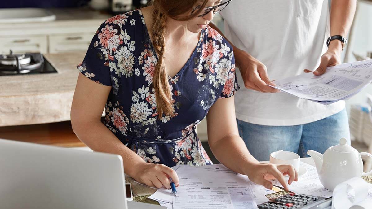 Man and woman doing paperwork.