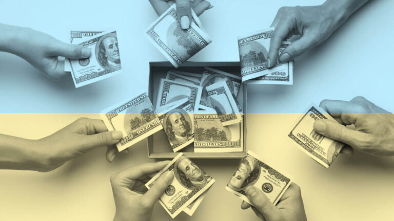 Hands putting $100 bills into a communal box.