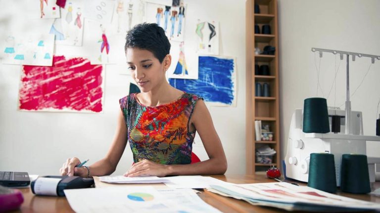 Independent contractor working in her office.