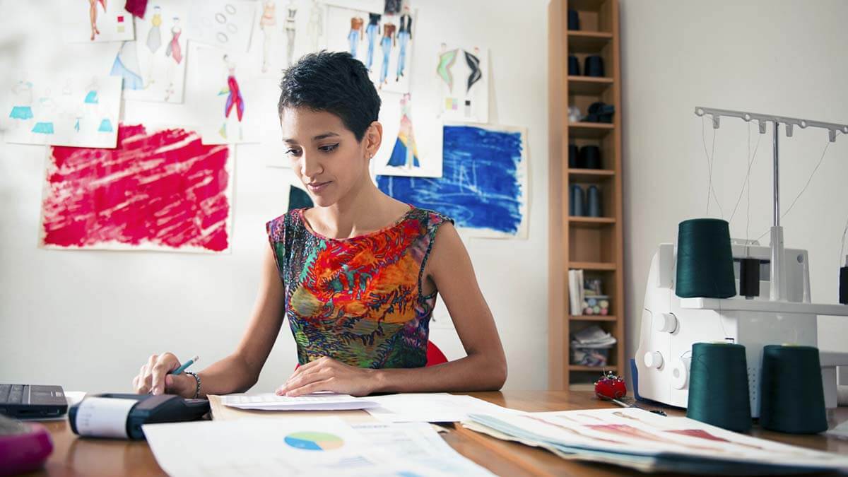 Independent contractor working in her office.
