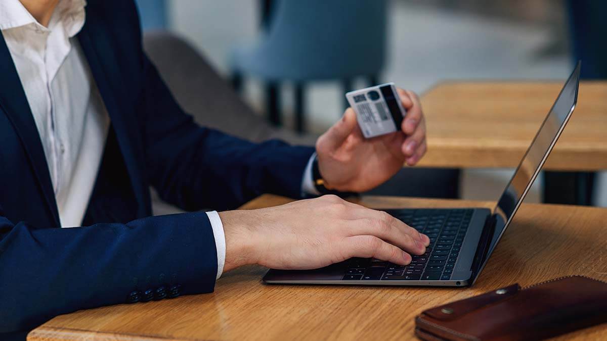 Employee holding a pay card.