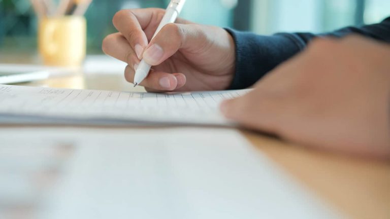 Employee filling out Form I-9.