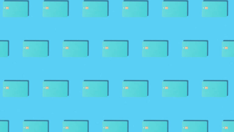 Rows of teal credit cards on a blue background.